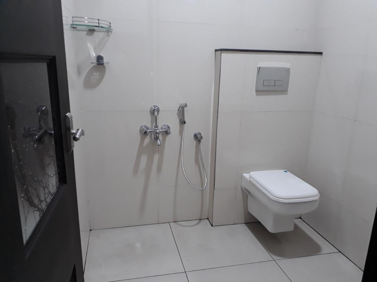 Hotel Muziris Manor Residency à Kochi Extérieur photo